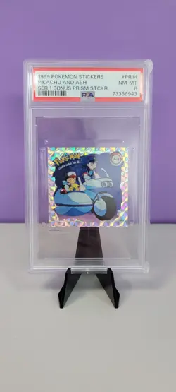 1999 POKEMON STICKERS #PR14 PIKACHU & ASH BONUS PRISM STICKER SERIES 1 PSA 8 - Image 1