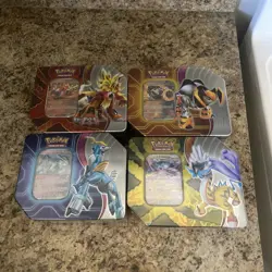 Pokemon TCG Paradox Destinies Tins Sealed - COMPLETE SET OF 4 - Image 1