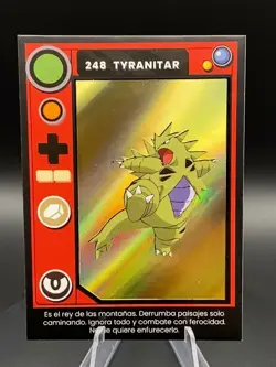 2025 POKEMON POKEDEX Kanto #248 TYRANITAR Peru Edition Gold Holo Foil - Image 1