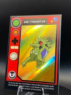 2025 POKEMON POKEDEX Kanto #248 TYRANITAR Peru Edition Gold Holo Foil - Image 4