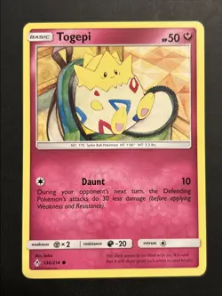 Togepi 136/214 Sm-Unbroken Bonds Regular NM Pokemon TCG - Image 1