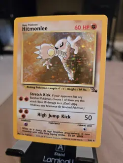 1999 POKEMON FOSSIL #7/62 HITMONLEE HOLO. Holo Wear, Decent Shape! - Image 1