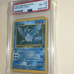 1999 POKEMON FOSSIL ARTICUNO - HOLO #2 PSA 8 - Image 1