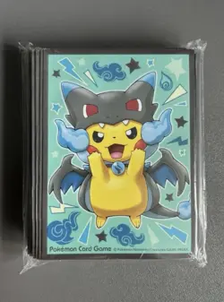 Pokemon Center Poncho-Wearing Pikachu Mega Charizard X Sleeves Sealed - Image 1