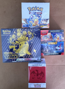 1 E Pokemon SURGING SPARKS Booster, ETB, Bundle and Charizard Alcove box SEALED - Image 1