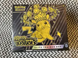 Pokemon TCG Scarlet & Violet - Surging Sparks Elite Trainer Box - Small tear - Image 1