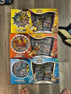 Pokemon TCG Flareon GX, Jolteon, Vaporeon Special Collection Box Set Of 3 - Image 1