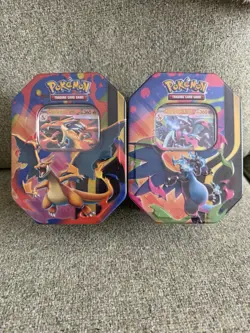 Pokemon TCG Tins 1x Mega Charizard x and 1x Mega Charizard Y Sealed Bundle - Image 1