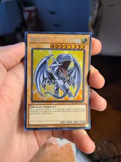 Yugioh Blue-Eyes White Dragon BLMM-EN001 1st Secret Rare - Image 1