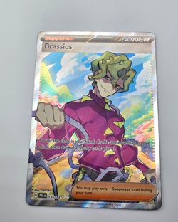 2025 Prismatic Evolutions Brassius 135/131 HOLO Ultra Rare Pokemon Card TCG - Image 1