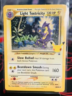 Pokemon TCG Celebrations Light Toxtricity SWSH137 Black Star Promo Holo NM - Image 1