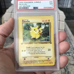 1999 Pokemon Jungle 1st Edition Pikachu #60/64 PSA 7 NM WOTC Non Holo - Image 1