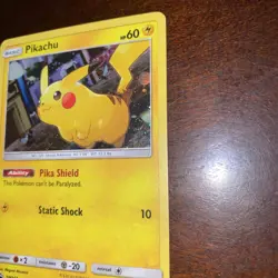 2018 Pokemon TCG Pikachu SM157 Black Star Promo Holo! Swirl - Image 2