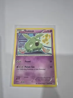 Trubbish 53/124 LP - Dragons Exalted Pokemon Card - Tomokazu Komiya Art - Image 1