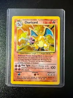 1999 Pokemon Base Set Charizard Holo #4/102 WOTC Unlimited – RAW - Image 1