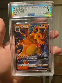 AGS 10 Legendary Pokemon HIDDEN FATES TINS 2019 PROMO CHARIZARD GX #SM211 - Image 1