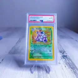 1999 POKEMON BASE SET UNLIMITED #11 NIDOKING-HOLO PSA 4 - Image 1