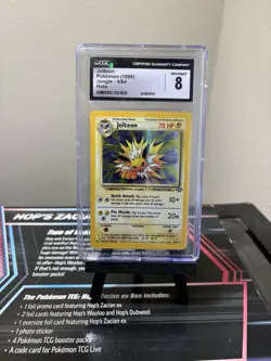 Jolteon CGC 8 Pokemon Card. Jungle Set 4/64 Rare Holo NM Condition 1999 WOTC - Image 1