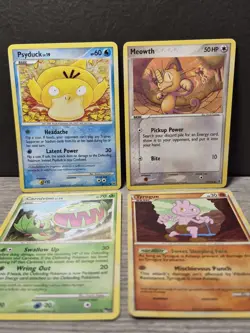Pokemon Card TCG Platinum Psyduck 87/127 Meowth Carnivine Tyrogue 4 Card Lot - Image 1