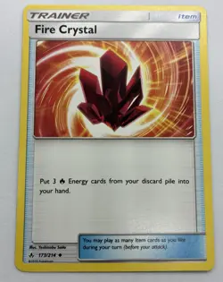 Pokemon TCG SM Unbroken Bonds Fire Crystal Trainer Card 173/214 NM/M - Image 1