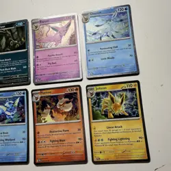 Pokemon TCG Prismatic Evolutions Costco Mini Tin Cosmos Promo Cards Set Of 8 NM - Image 2