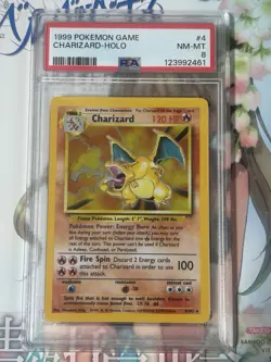 1999 Pokemon Base Set Charizard #4 Holo PSA 8 - Image 1