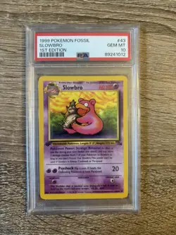 1999 POKEMON FOSSIL 1ST ED #43 SLOWBRO PSA 10 First Edition - Image 1