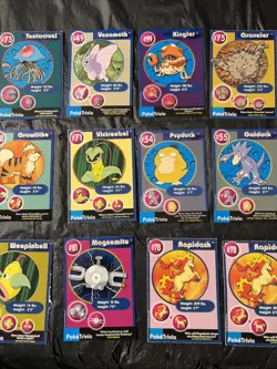PokeTrivia Lot Of 12 Pokemon Cards Total Psyduck, Growlithe, And More - Image 1