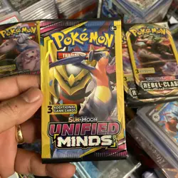 Pokemon Unified Minds 3 Card Mini Booster Pack Sealed Unweighed - Image 1