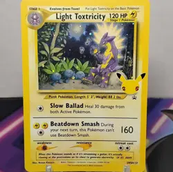 Pokemon TCG Light Toxtricity with (SWIRL) SWSH137 Promo Holo 25th Anniversary NM - Image 1