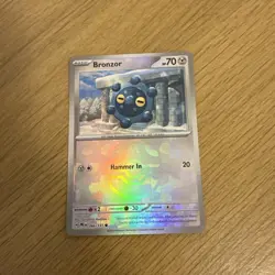 Bronzor Master Ball Reverse Holo Pokemon TCG Prismatic Evolutions 066/131 NM - Image 1