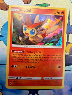 Victini 10/145: 2017 Pokemon TCG Sun and Moon-Guardians Rising Holo NM - Image 1