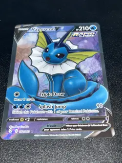 The Pokemon Company Vaporeon V Rapid Strike Ultra Rare SWSH07 Holo 210 HP Card - Image 1