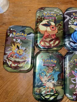 10 Pokemon TCG Scarlet & Violet Prismatic Evolutions Mini Tins - Image 2