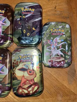 10 Pokemon TCG Scarlet & Violet Prismatic Evolutions Mini Tins - Image 4