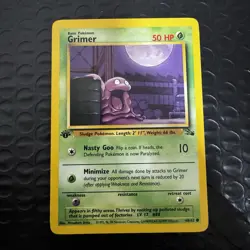 1999 Pokemon Fossil Grimer 1st Edition 48 NM/Mint - Image 1