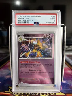 PSA 9 ALAKAZAM REVERSE HOLO 056/132 MEGA EVOLUTIONS POKEMON CARD - Image 1