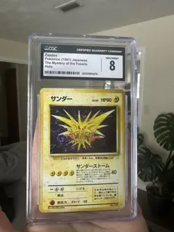 Zapdos | Pokemon Mystery of the Fossils (1997) |CGC NM/MINT 8 w/ Holo SWIRL - Image 1
