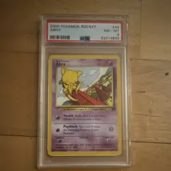 Pokemon Team Rocket Abra 49/82 PSA 8 Unlimited Regular 2000 Wizards - Image 1