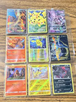 Pokemon TCG Holofoil Card Lot Charizard, Pikachu, Raichu, Yveltal, Kingdra - Image 1