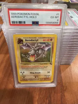 1999 POKEMON FOSSIL #1 AERODACTYL-HOLO PSA 6 - Image 1