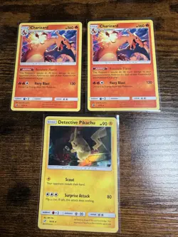 Pokemon Lot 2x Charizard 3/70 , Detective Pikachu 10/18 Holo - Image 1