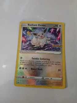 Radiant Eevee SWSH230 Pokemon Go Promo NM - Image 1