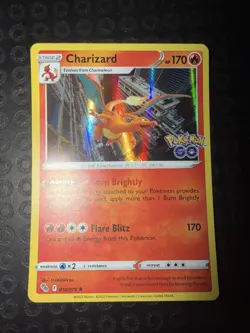 POKEMON CHARIZARD #010/078 RARE HOLOFOIL NM POKEMON GO CARD - Image 1