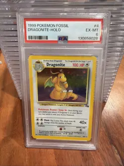 1999 POKEMON FOSSIL #4 DRAGONITE-HOLO PSA 6 - Image 1