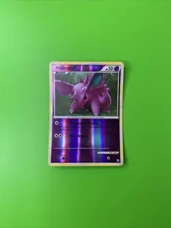 Nidoran 70/102 Triumphant Reverse Holo Pokemon Card LP+ - Image 1