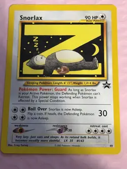 2002 Pokemon League Snorlax #49 WOTC Black Star Promo - Image 1