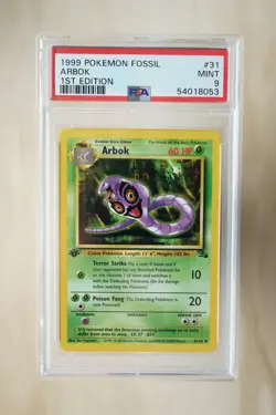 1999 Pokemon Fossil Arbok 1st Edition 31/62 PSA 9 MINT - Image 1