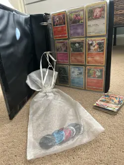 Pokemon binder with Pokemon Coins and Cards included - Image 1