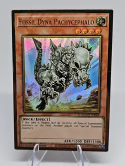 Yugioh Fossil Dyna Pachycephalo MGED-EN008 Gold Rare 1st Ed - Image 1